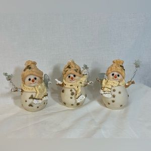 Cute snowmen figurines. Matching set of 3, all with hat & scarf.